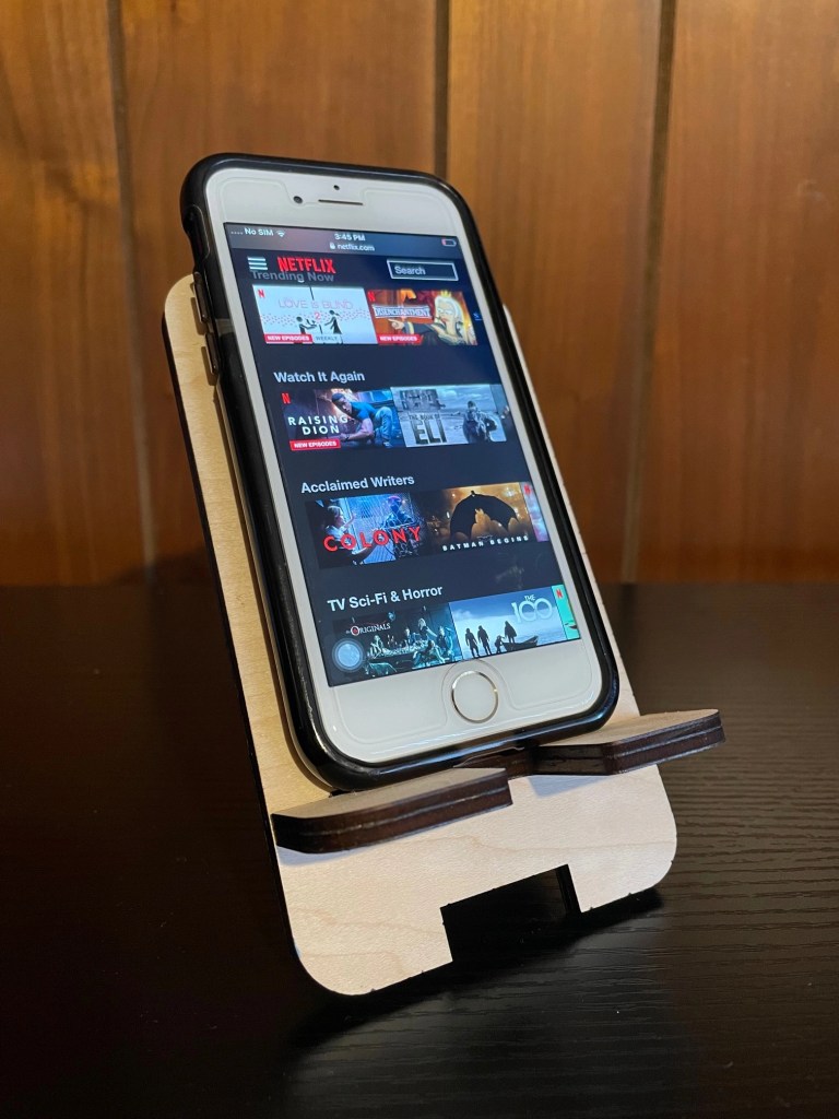 Phone stand created with laser engraving.